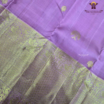 A graceful rose pink body highlighted with delicate gold zari Saree