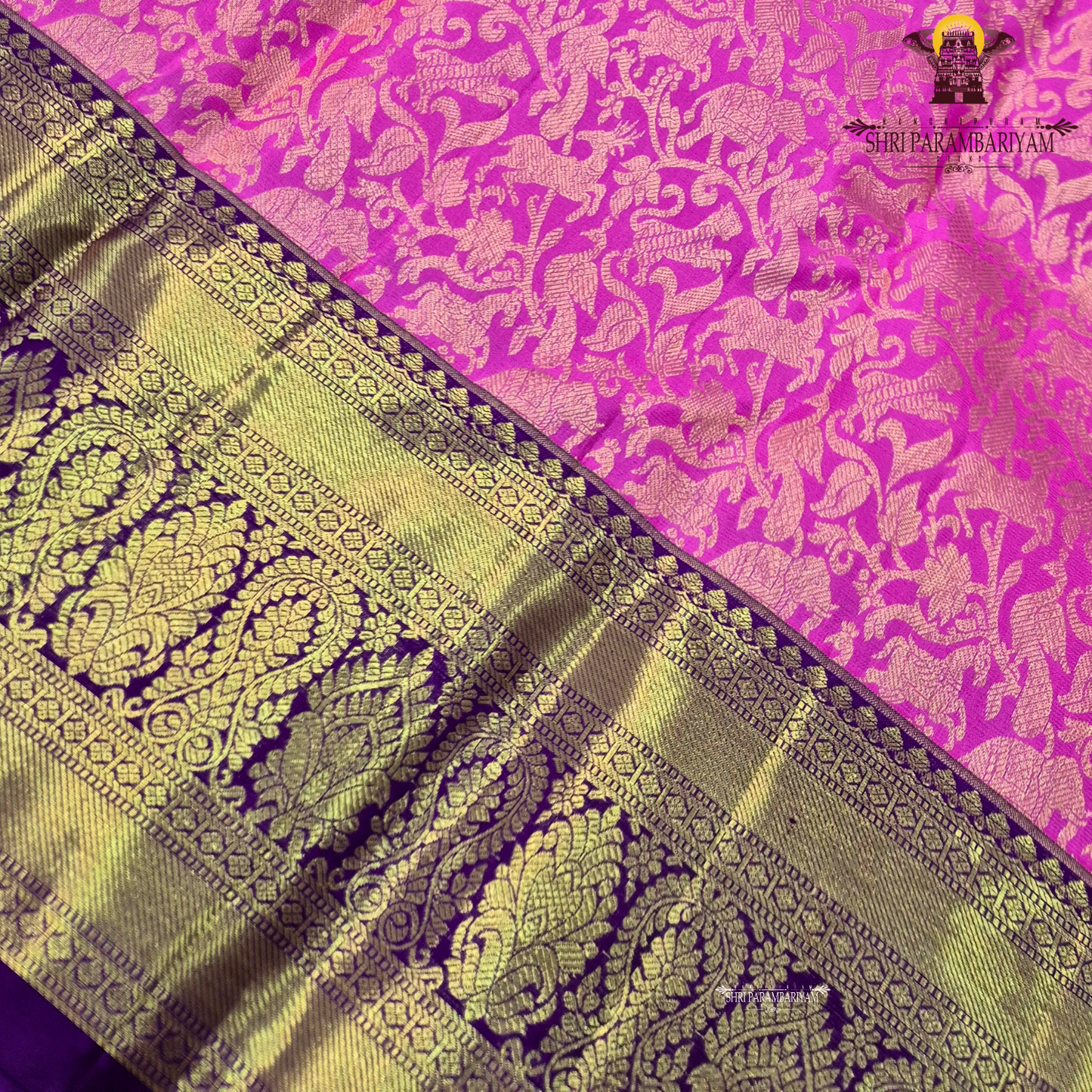 A bright bubblegum pink / rose pink body paired with a rich royal purple Saree