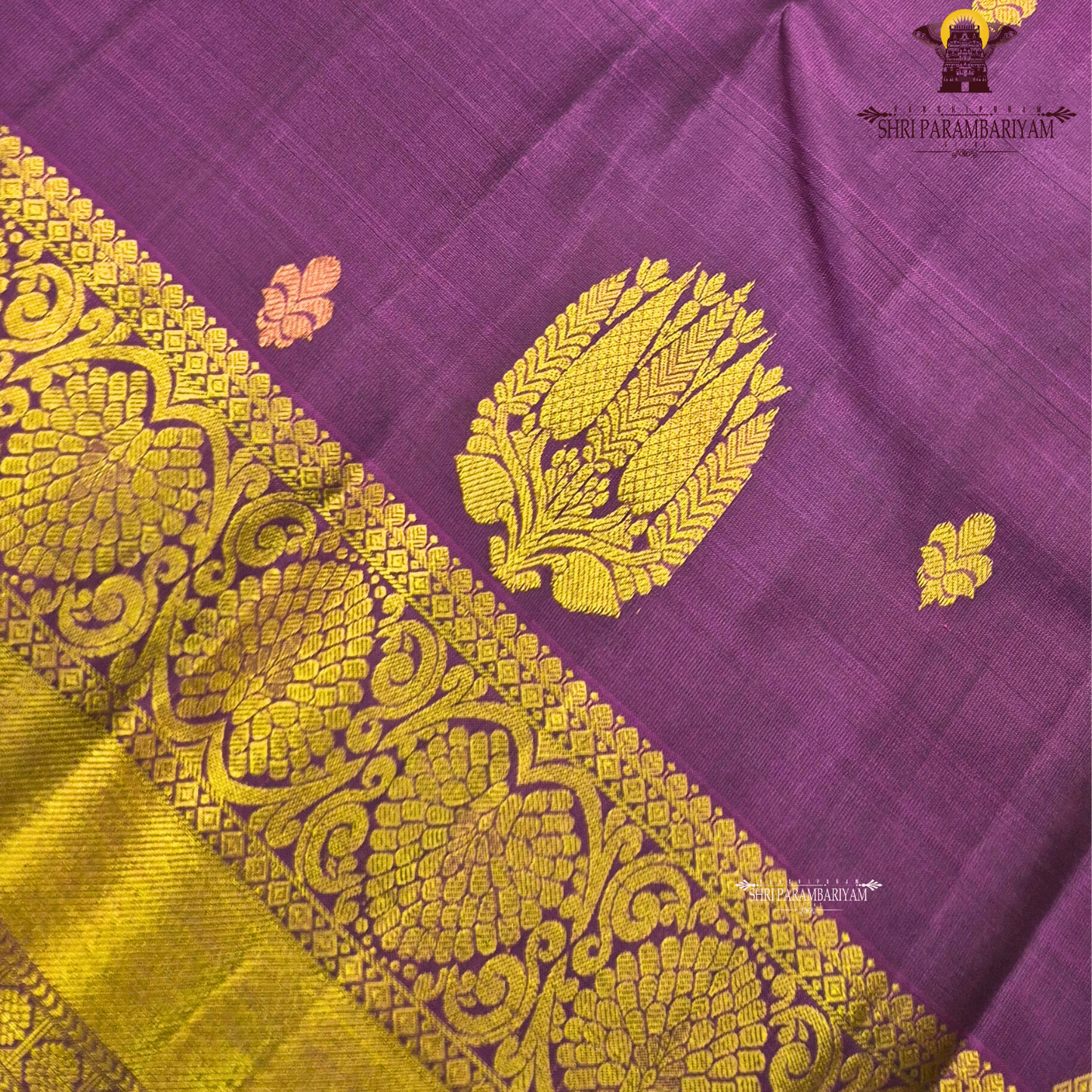 Royal violet (deep purple shade) with a rich antique gold zari border Saree
