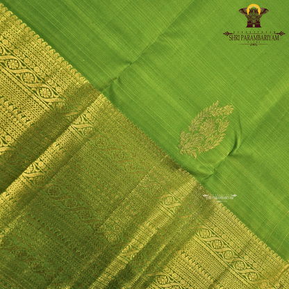 A rich Parrot Green with rich Gold zari work Saree