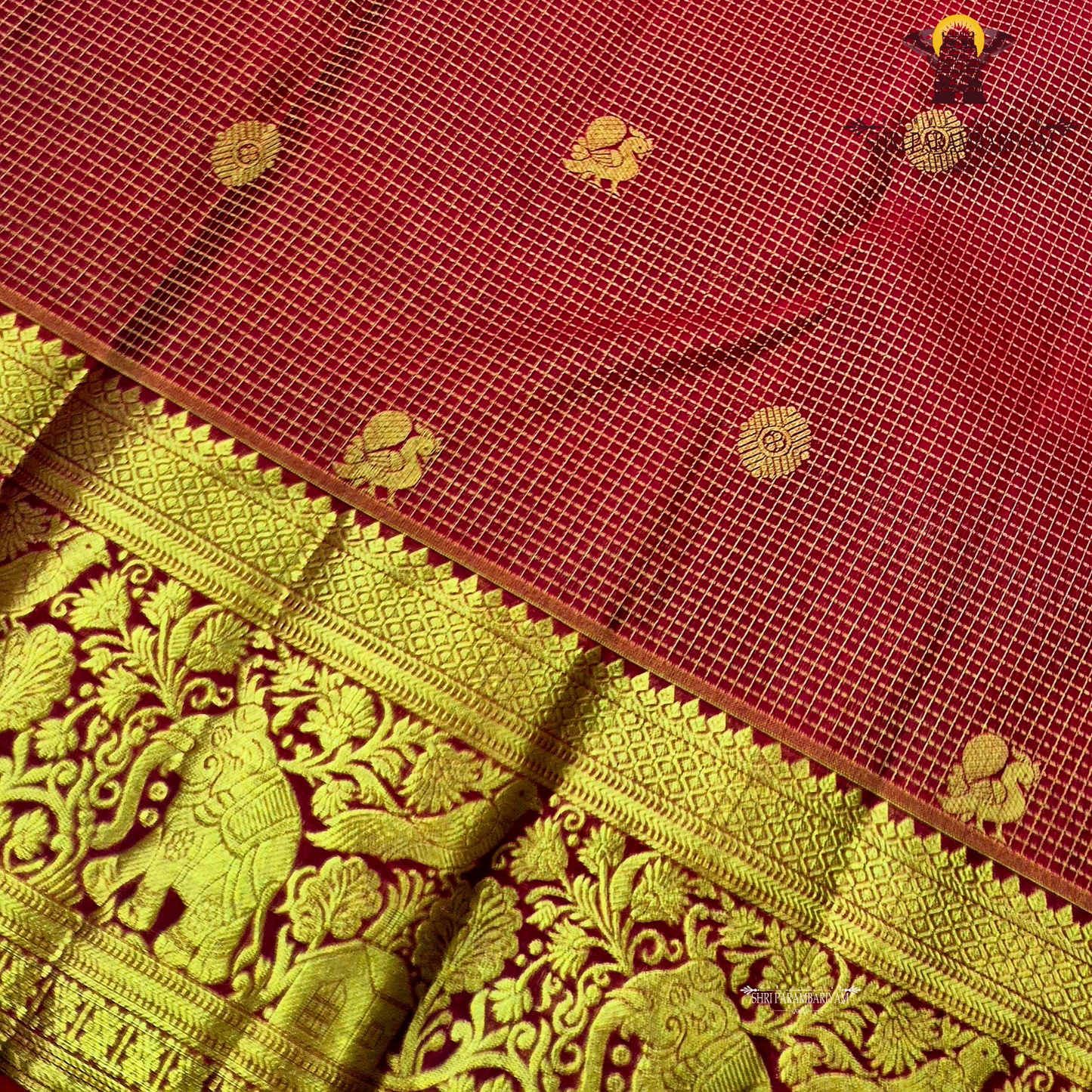 A classic and traditional maroon with gold combination Saree