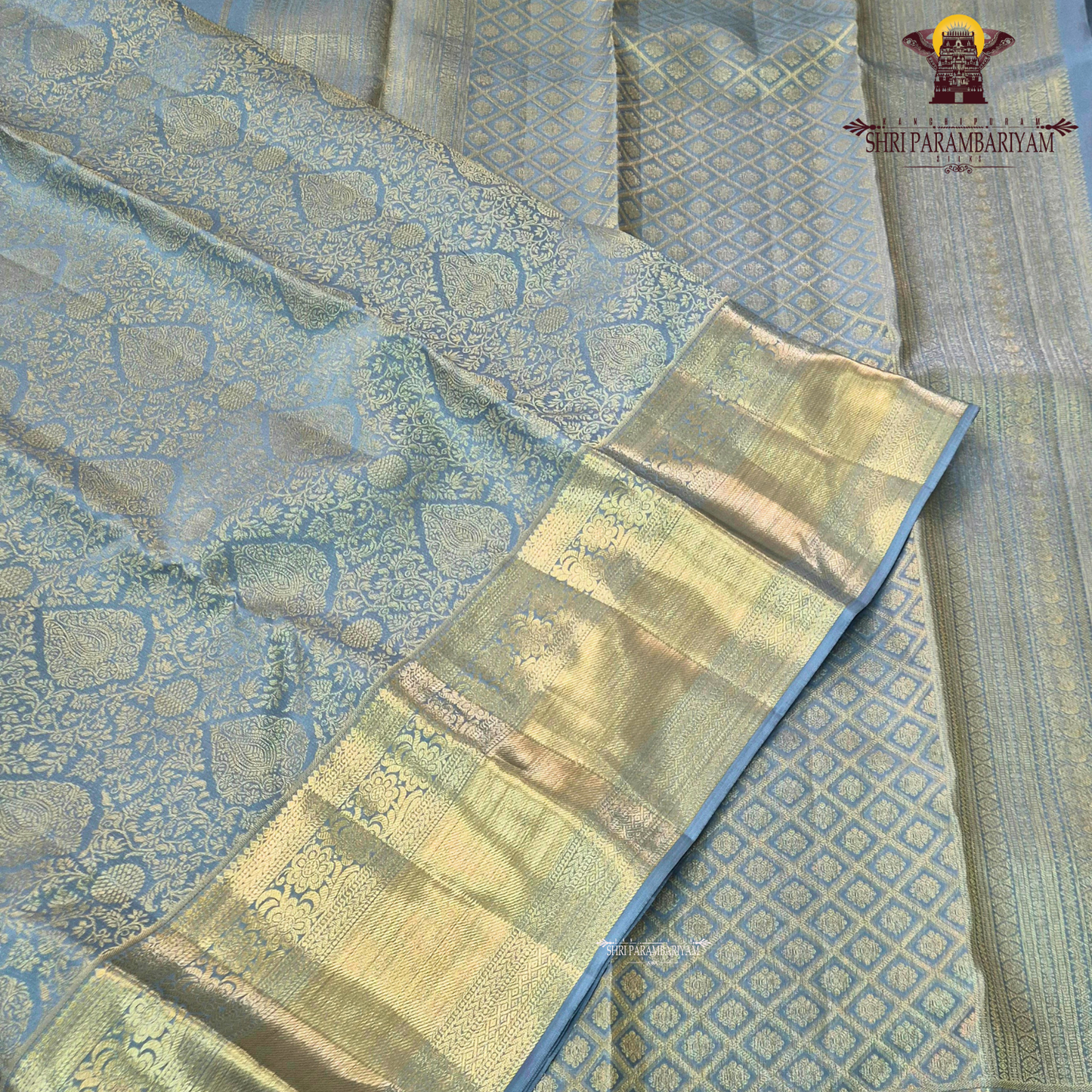 Elegant pastel blue / muted sky blue with rich gold zari Saree