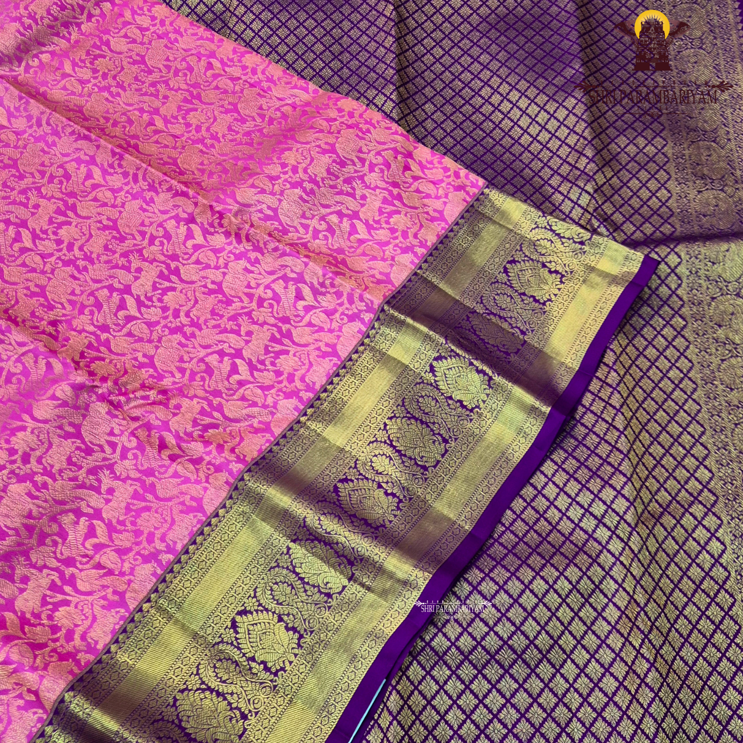 A bright bubblegum pink / rose pink body paired with a rich royal purple Saree