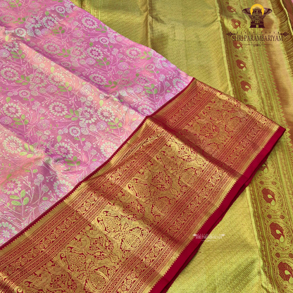 Soft pastel pink (tissue body) with a rich deep red border Saree