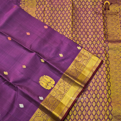 Royal violet (deep purple shade) with a rich antique gold zari border Saree