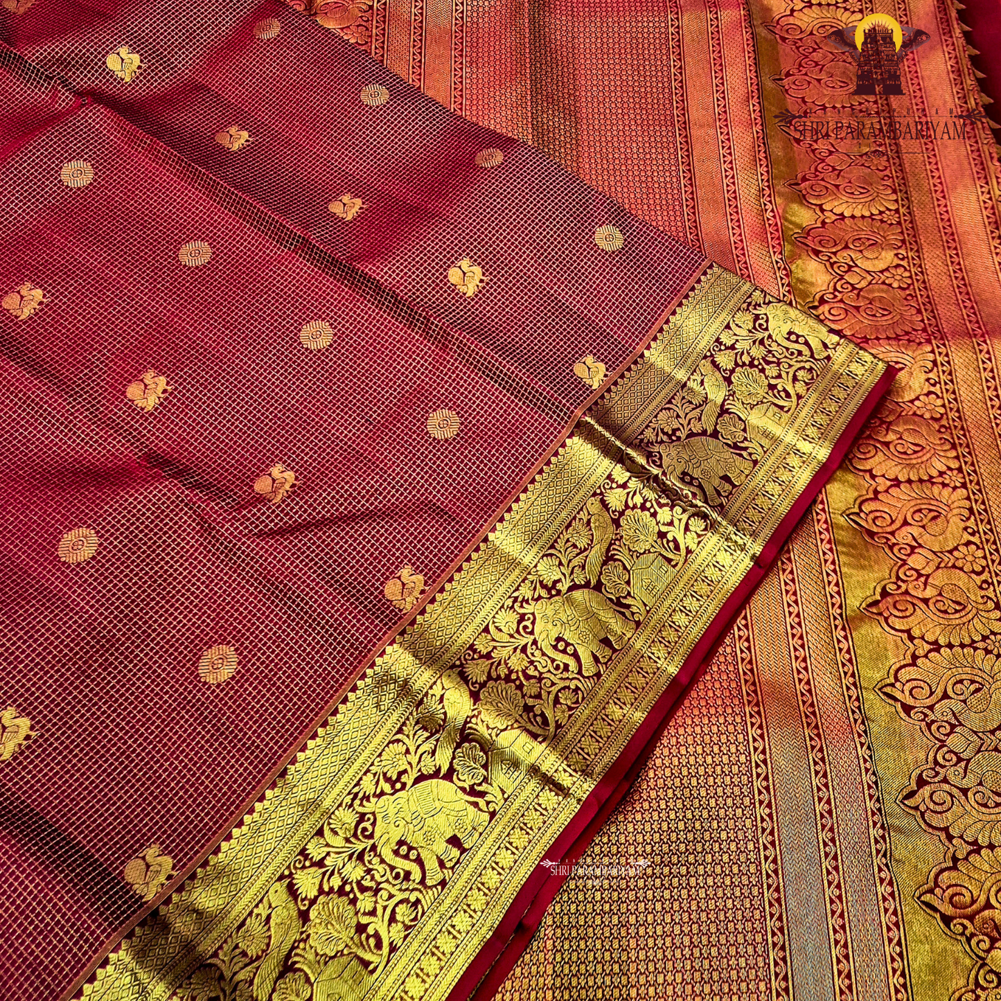 A classic and traditional maroon with gold combination Saree