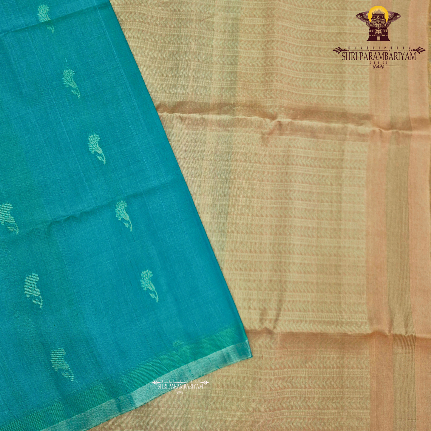 A rich peacock teal green shade that beautifully blends vibrance with elegance Saree