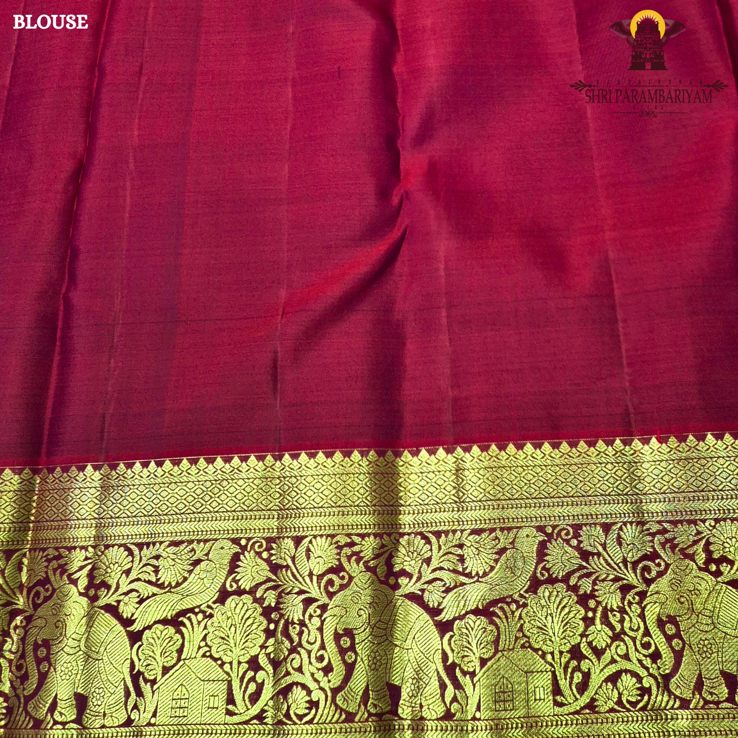 A classic and traditional maroon with gold combination Saree