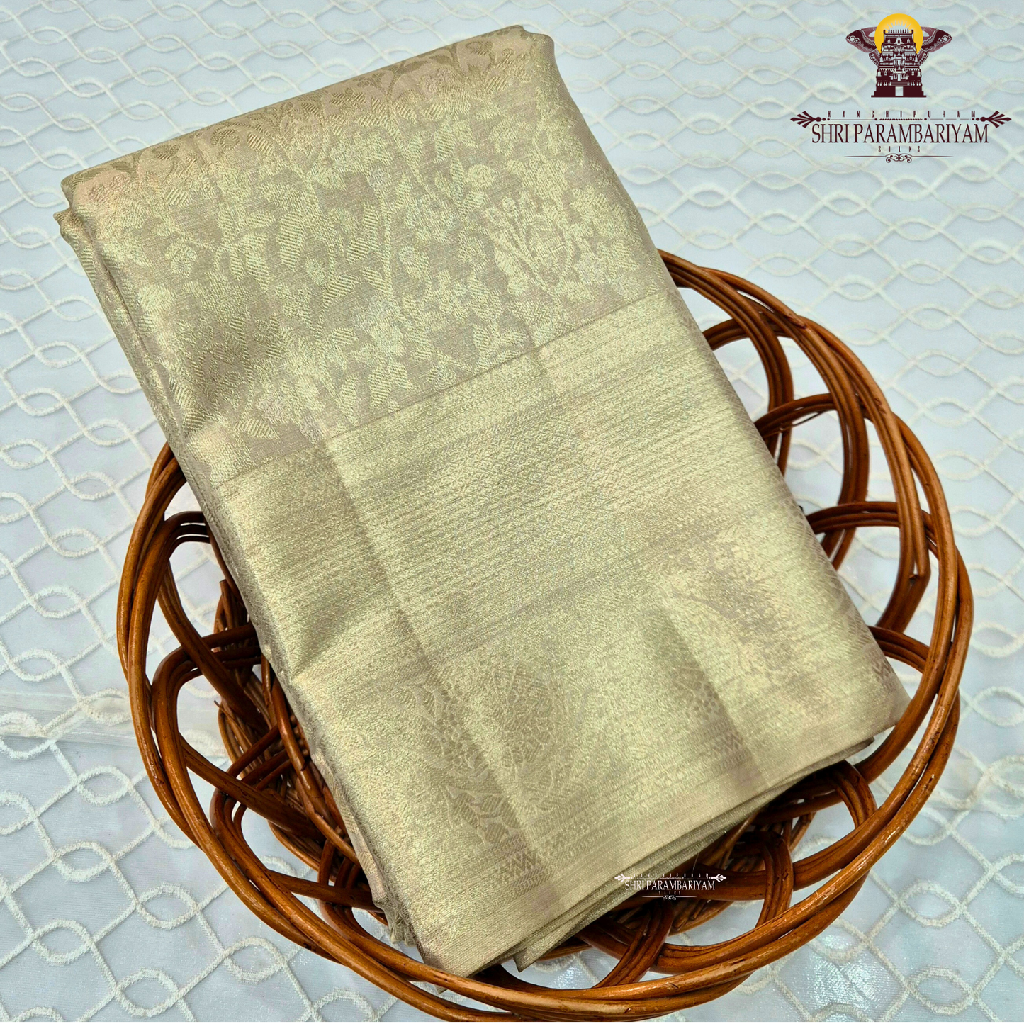 A sophisticated champagne gold shade that radiates a soft, luxurious sheen Saree