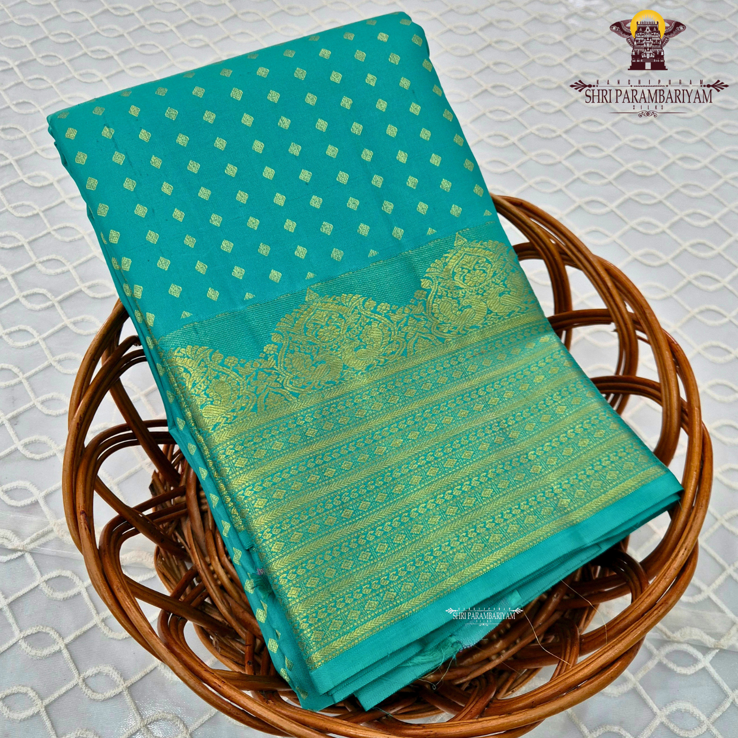 Vibrant peacock green / teal green with rich gold zari Saree