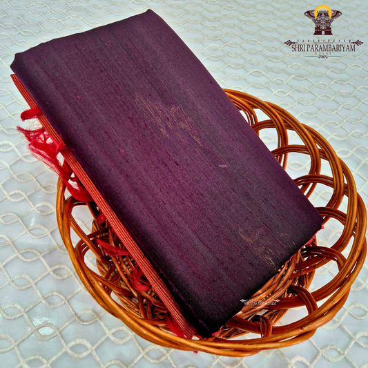 A rich deep plum purple shade with subtle natural sheen Saree