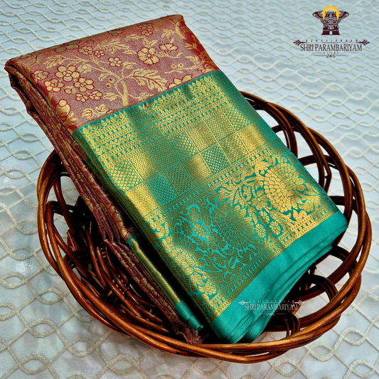 Elegant brick red / maroon tone with a soft tissue sheen Saree