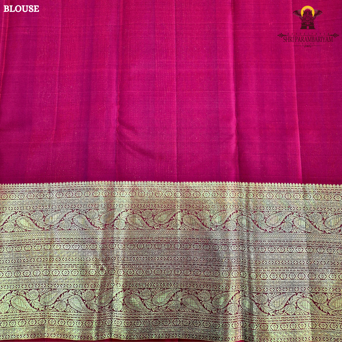 A luxurious deep black grape shade, adorned with delicate gold zari Saree