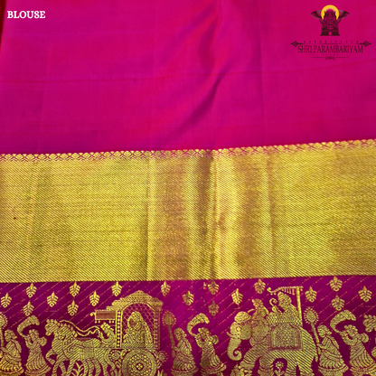 A bright Rani Pink with rich Gold zari Saree