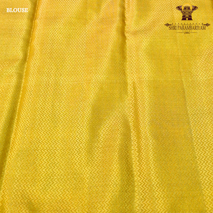 A rich mustard yellow (golden yellow) shade with a subtle shimmering Saree