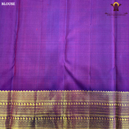 A deep Magenta Purple / Rani Purple with a rich dual-tone Saree