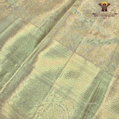 A sophisticated champagne gold shade that radiates a soft, luxurious sheen Saree