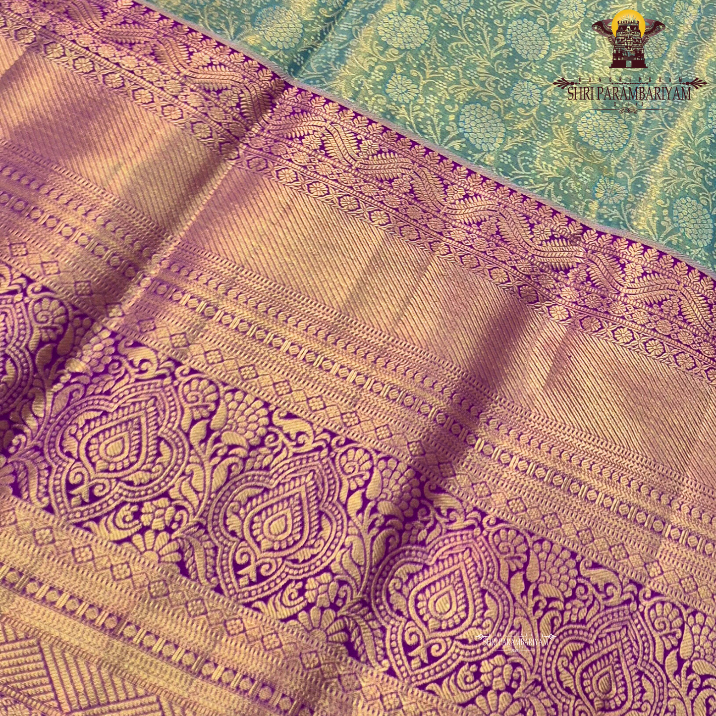 A radiant teal green tissue body paired with a rich royal purple border Saree