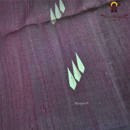 A rich deep plum purple shade with subtle natural sheen Saree