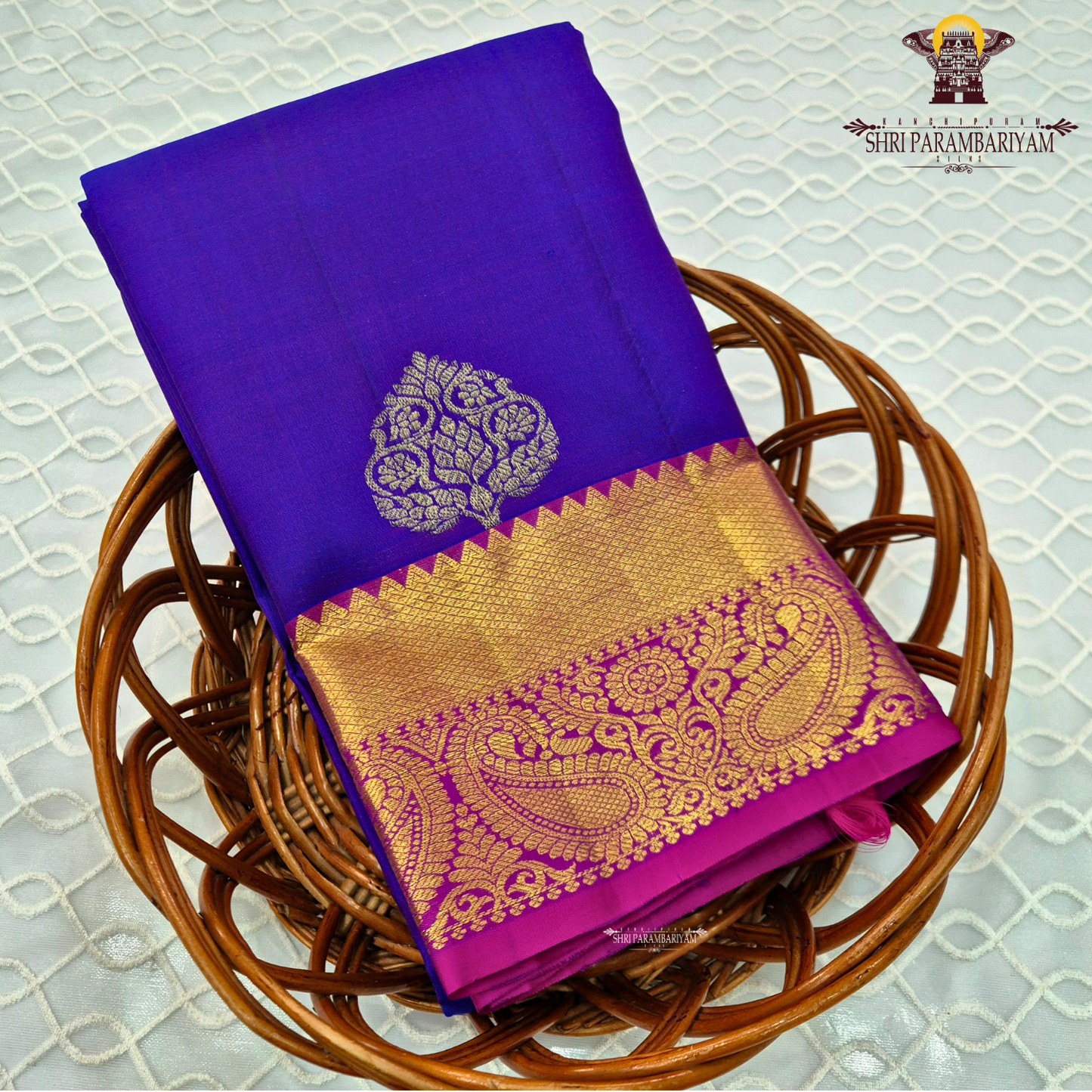 A vibrant royal purple (violet) body paired with a contrast Saree
