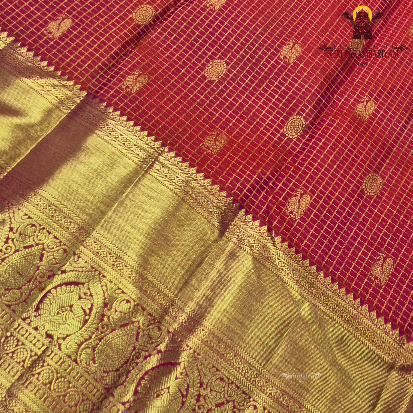 A vibrant and festive rani pink with heavy gold richness Saree