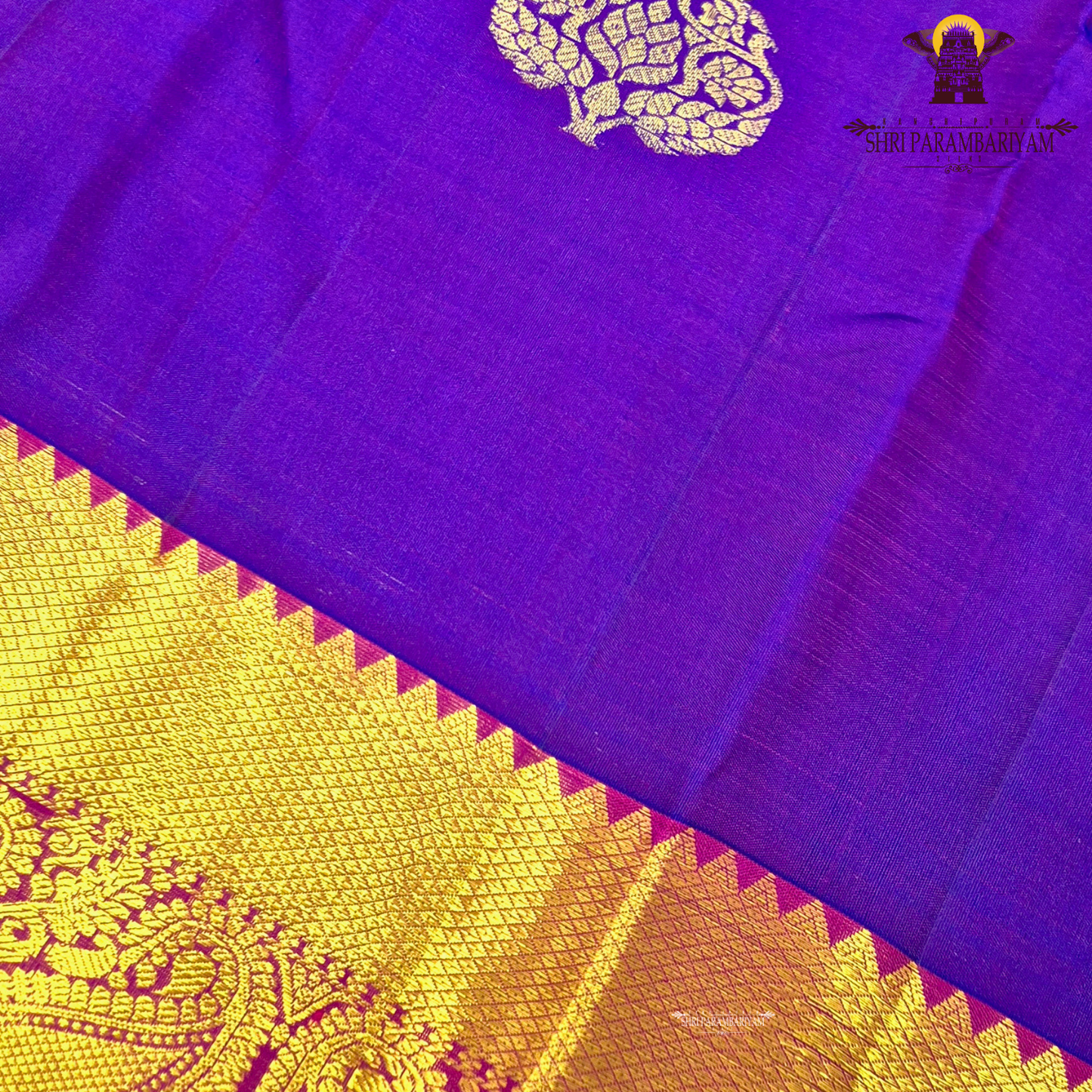 A vibrant royal purple (violet) body paired with a contrast Saree