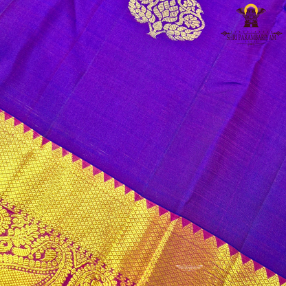 A vibrant royal purple (violet) body paired with a contrast Saree