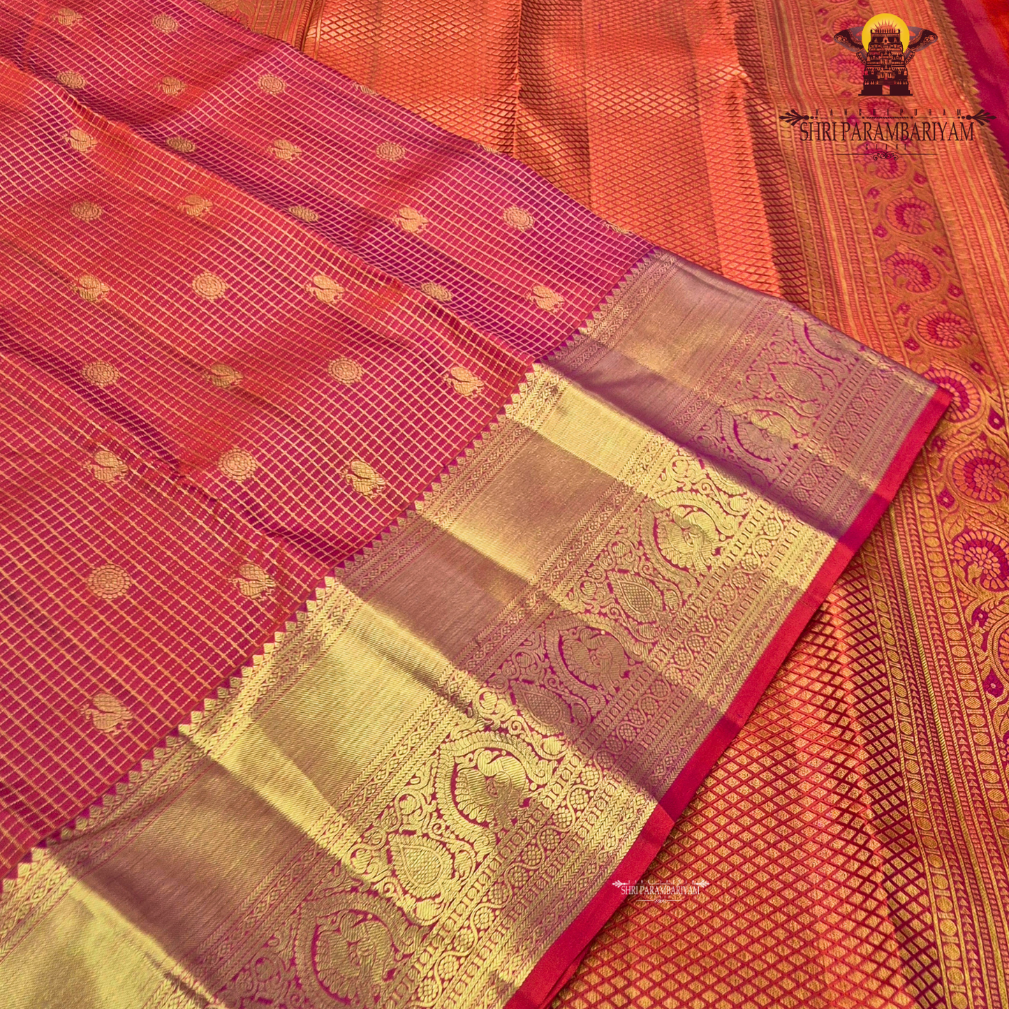 A vibrant and festive rani pink with heavy gold richness Saree