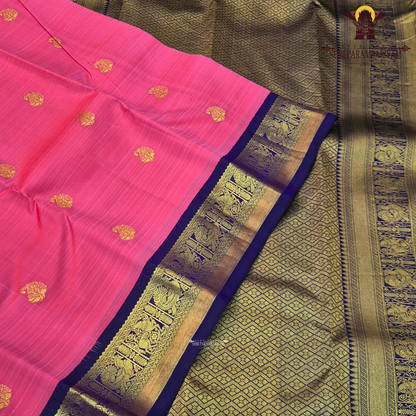 A charming rose pink body beautifully adorned with traditional Saree
