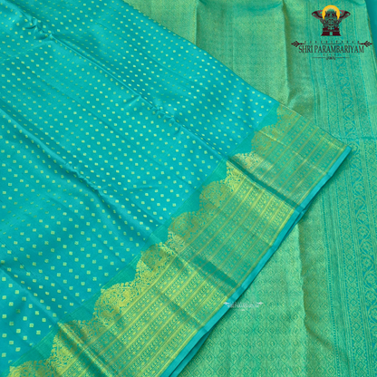 Vibrant peacock green / teal green with rich gold zari Saree