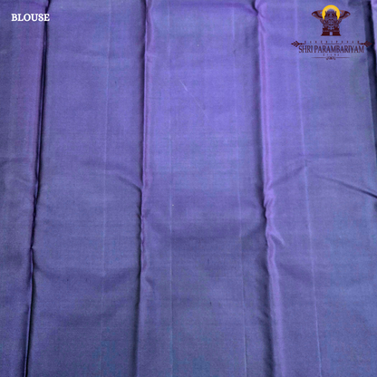 A rich deep plum purple shade with subtle natural sheen Saree