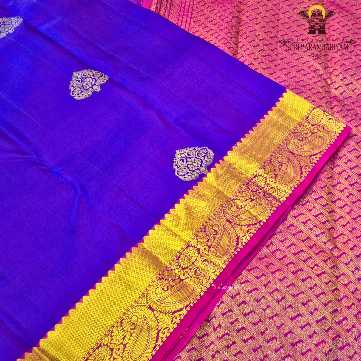 A vibrant royal purple (violet) body paired with a contrast Saree