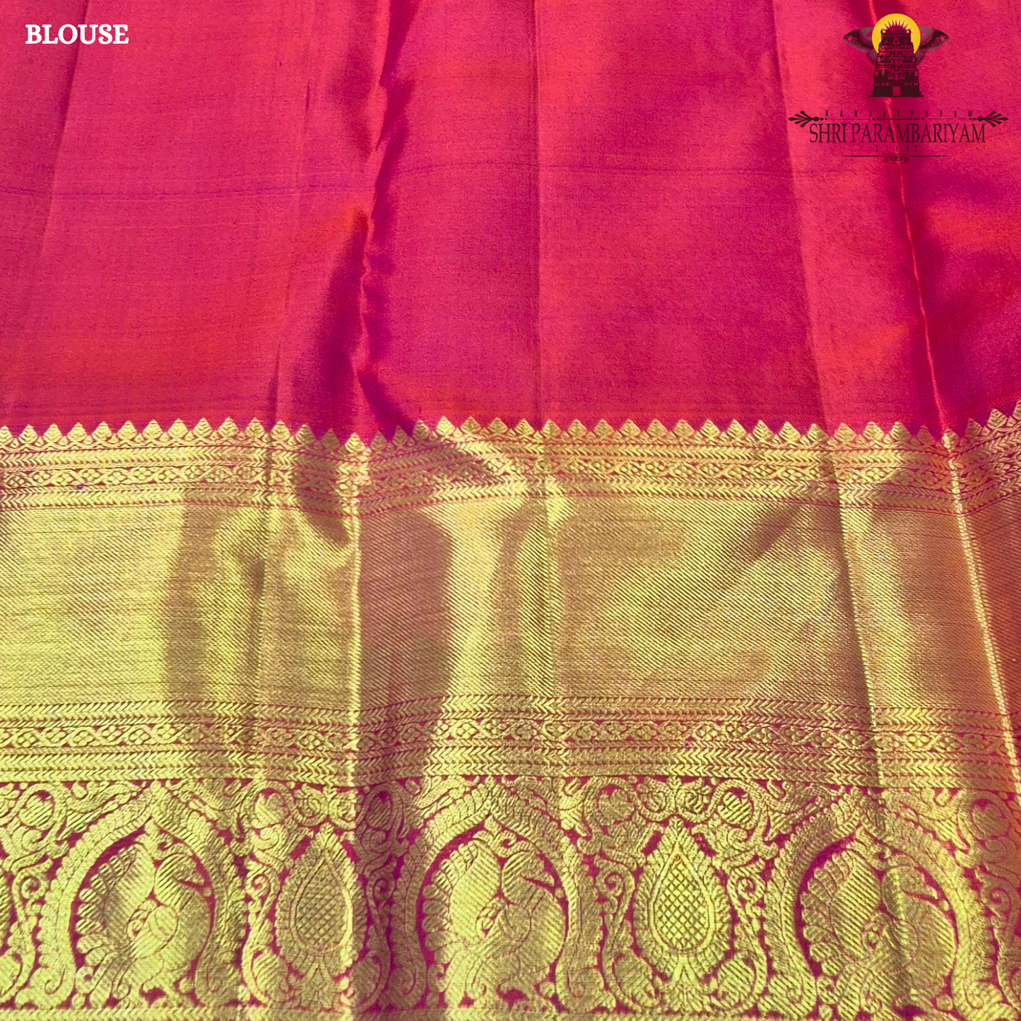 A vibrant and festive rani pink with heavy gold richness Saree