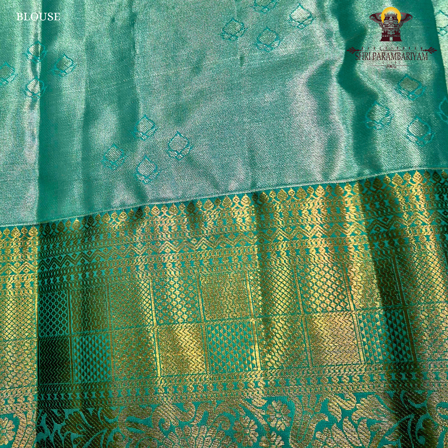 Elegant brick red / maroon tone with a soft tissue sheen Saree