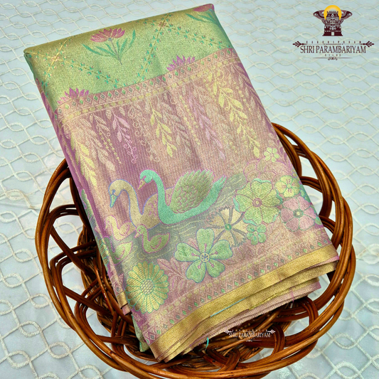 A beautiful dual-tone blend of pastel pista green and soft lavender pink Saree