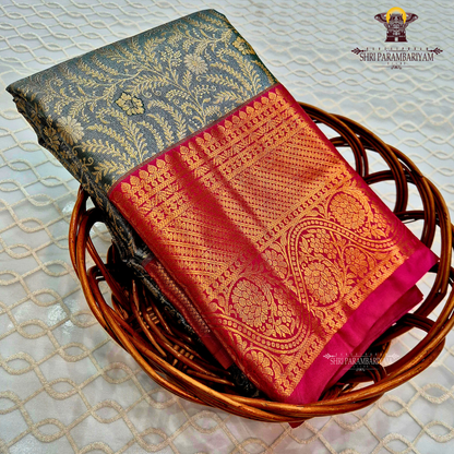 Sophisticated smoky grey / charcoal grey with a subtle tissue sheen Saree