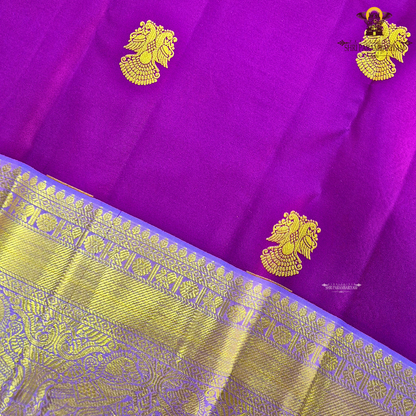 A rich royal purple body with a lustrous finish, beautifully complemented Saree