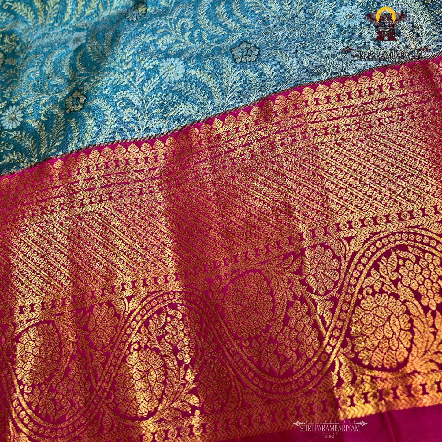 Sophisticated smoky grey / charcoal grey with a subtle tissue sheen Saree