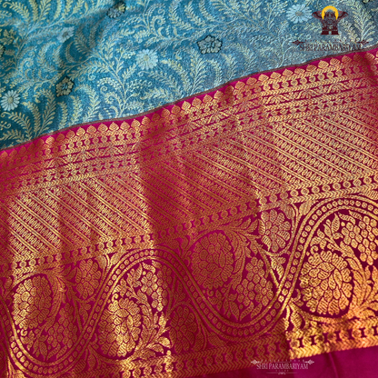 Sophisticated smoky grey / charcoal grey with a subtle tissue sheen Saree