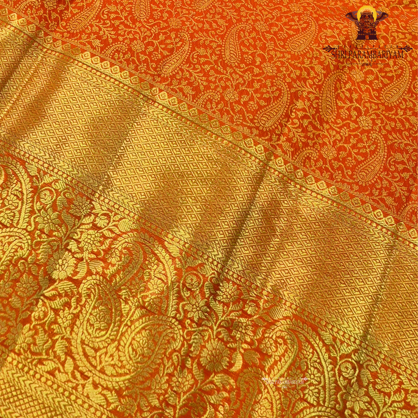 Bright vermilion orange / reddish orange with rich gold zari Saree