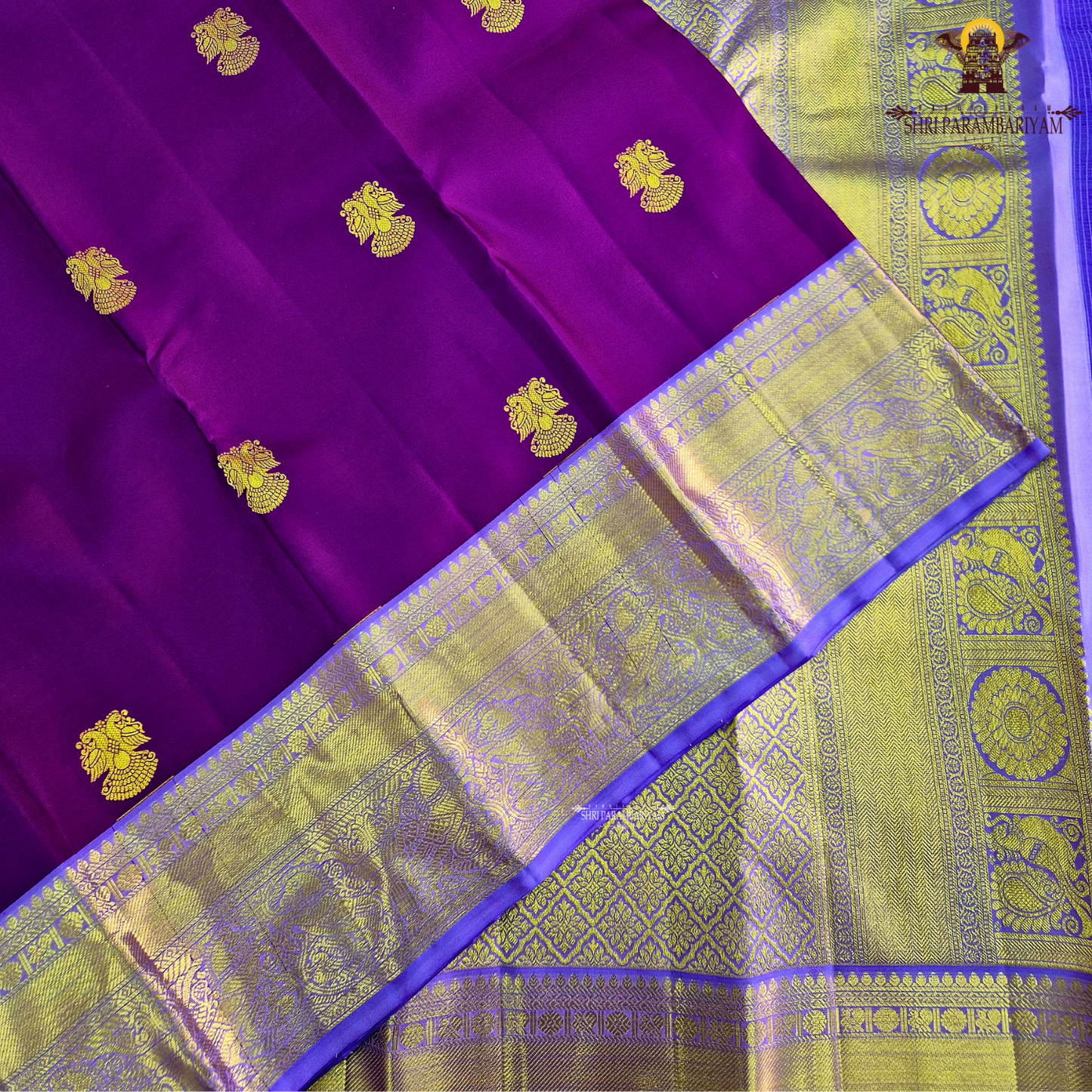A rich royal purple body with a lustrous finish, beautifully complemented Saree