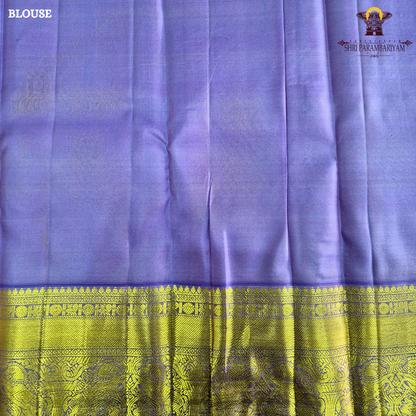 A rich royal purple body with a lustrous finish, beautifully complemented Saree