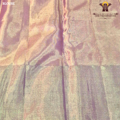 A beautiful dual-tone blend of pastel pista green and soft lavender pink Saree