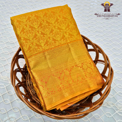 Deep marigold yellow / mustard yellow with rich gold zari Saree