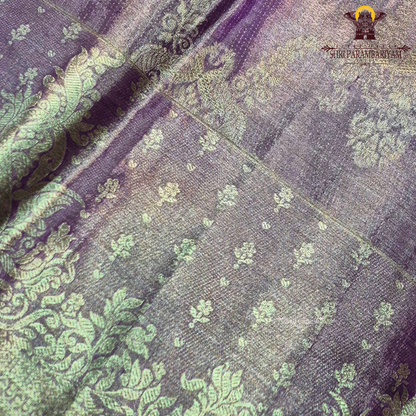 A beautiful lavender purple shade enhanced with a shimmering silver tissue finish Saree