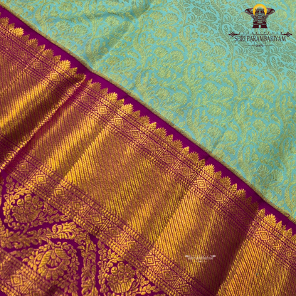 A refreshing pastel aqua blue shade with an elegant self floral jacquard Saree