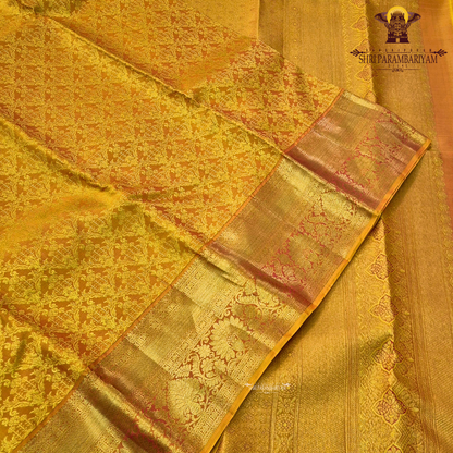 Deep marigold yellow / mustard yellow with rich gold zari Saree