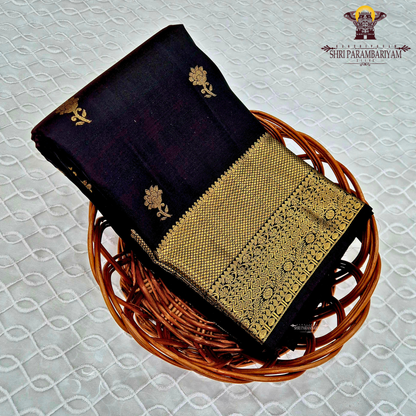 A classic Dark Bottle Green with rich Gold zari Saree