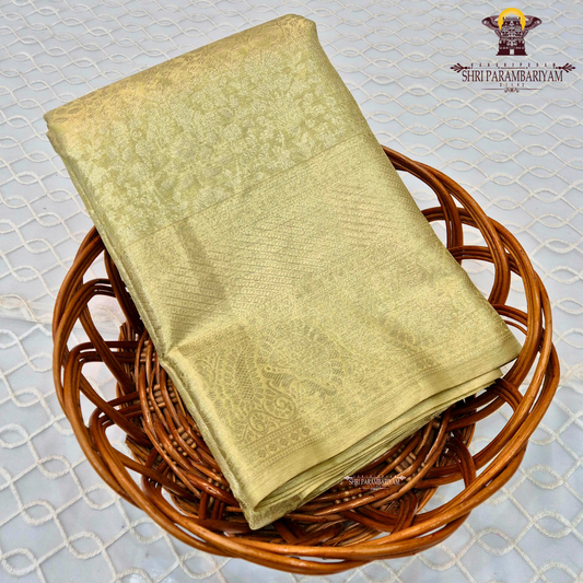 A beautiful light pistachio gold shade that gives a soft and graceful shine Saree