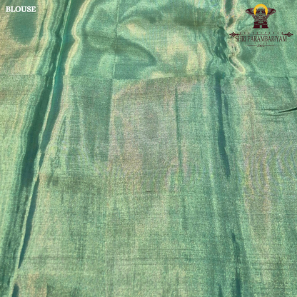 An elegant dual-tone combination of pastel peach and refreshing mint green Saree
